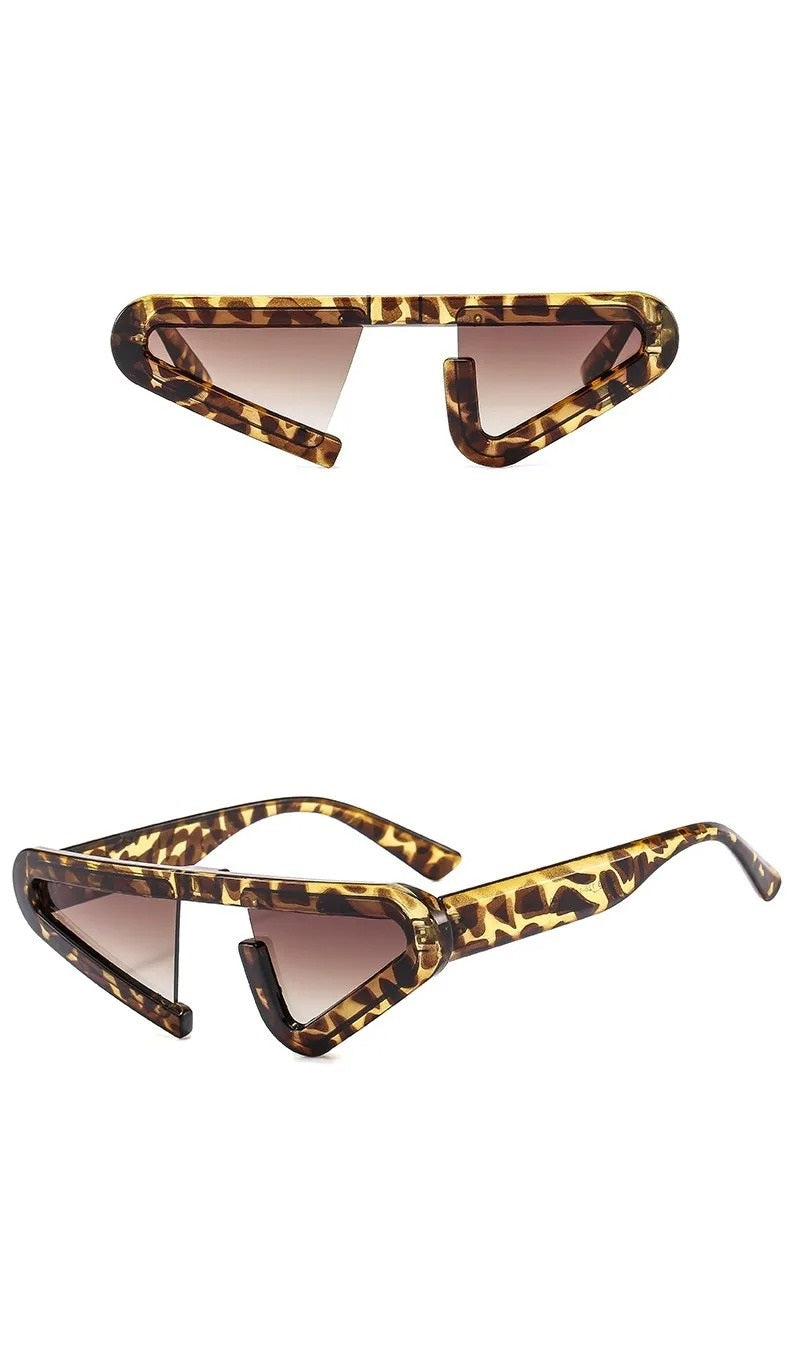 front view and side view futuristic leopard cat eye frame shape sunglasses with graded brown lens techno rave sunglasses