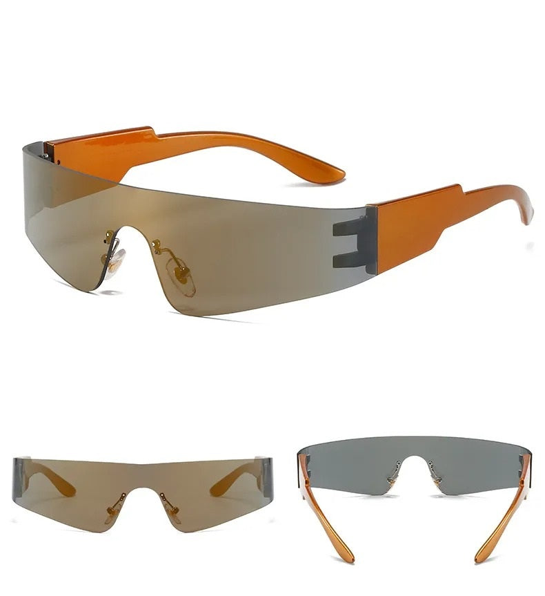 front reat and side view of silver visor and orange frame techno sunglasses