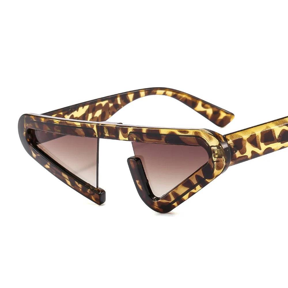 front view futuristic leopard cat eye frame shape sunglasses with graded brown lens techno rave sunglasses